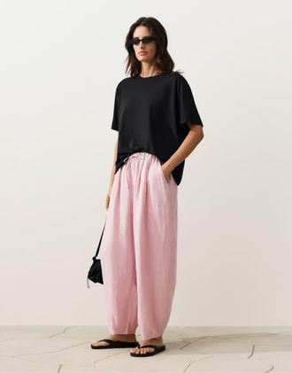 Oysho Pantaloni a palloncino in 100% lino color rosa polvere a pieghe