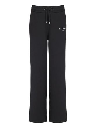 Balmain logo-print track pants - women - Cotton - M - Black