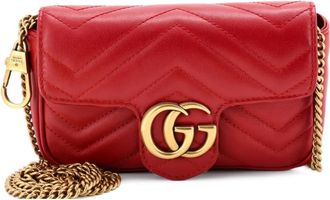 Gucci Borsa a tracolla GG Marmont super mini in pelle matelass&egrave; con battente - Rosso