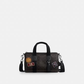 Coach Explorer Duffle Bag 28 In Signature Canvas With Patches