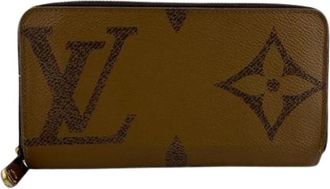 Louis Vuitton Pre-owned Vintage Lange portemonnee (bi-fold) - Dames - Vintage Accessoires - Bruin - ONE Size - Leer - Vintage