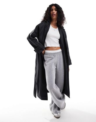 Asos rubberized rain hooded trench coat with belt detail in black