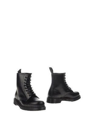 Dr. Martens CALZATURE - Stivaletti su YOOX.COM