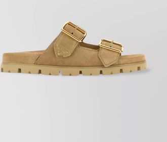 Prada suede slip-ons with rubber sole and gold-tone hardware