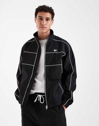 Tommy Jeans Giacca sportiva nera con profili a contrasto e logo a bandiera sul petto-Nero