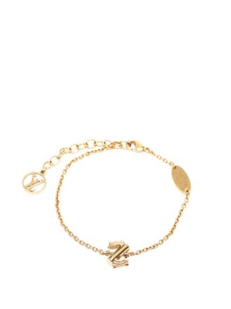 Louis Vuitton Bracciale LV & Me S in ottone placcato oro 2015