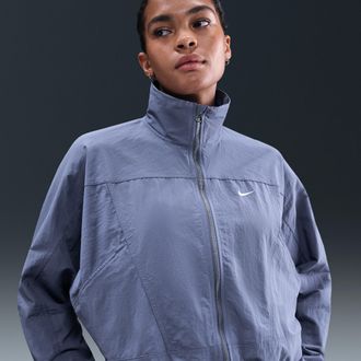 Nike Womens Nike Sportswear Everything Wovens Oversized Repel UV Protection Jacket in Blue | HJ0999-499