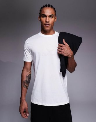 A|X Armani Exchange T-shirt color bianco sporco con logo centrale