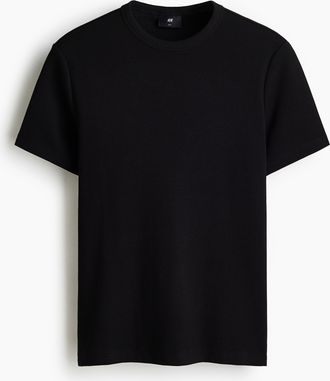 H&M Geripptes T-Shirt in Slim Fit - Schwarz