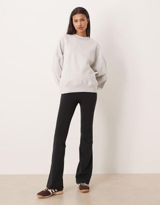 adidas adidas Performance - Three Stripes Studios - Pantaloni a zampa neri con fascia in vita incrociata-Nero