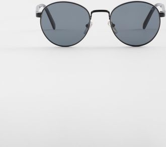 Prada Sunglasses with the iconic metal plaque