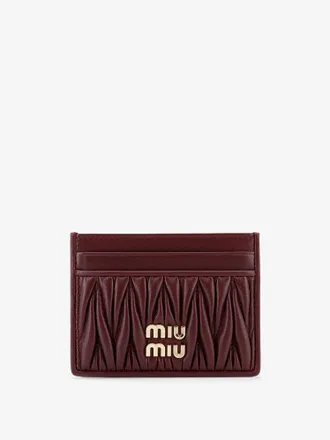 Miu Miu Portacarte in pelle matelass&eacute; con logo lettering in metallo - MIU MIU - gender_Woman
