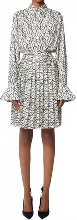 Nina Ricci All Over Logo Pleated Mini Skirt In Cream/noir