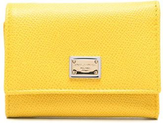 Dolce & Gabbana logo-plaque compact wallet - women - Calf Leather - One Size - Yellow