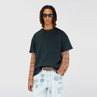 Diesel T-shirt with frayed edges and crystal details - T-Shirts - Man - Black