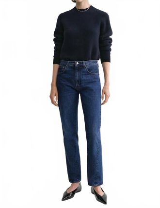 Toteme Vintage Medium Rise Twisted Seam Pants In Blue