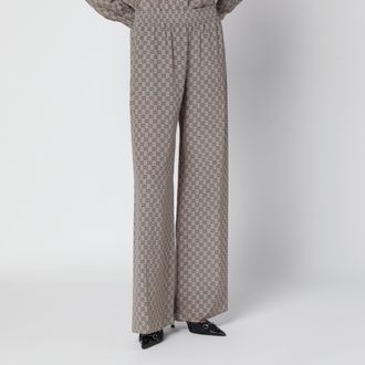 Gucci Pantaloni leisure beige in seta stampata