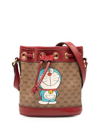 Gucci Borsa a secchiello Doraemon micro in tela GG Supreme 2016-2025 - Marrone
