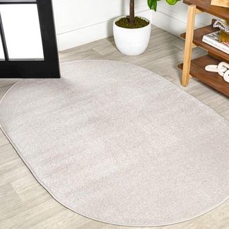 Jonathan Y Designs Haze Solid Low-Pile Oval Area Rug in Eggshell/ivory at Nordstrom, Size 4Ft 0In X 6Ft 0In