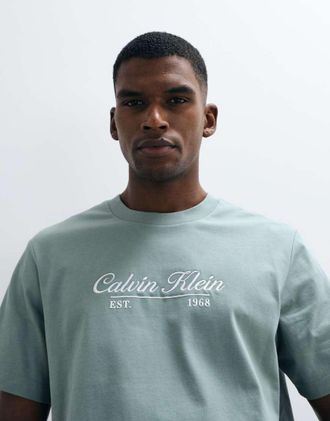 Calvin Klein Jeans T-shirt color pistacchio con scritta centrale-Verde