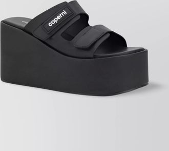 Coperni bold platform sandals featuring signature print