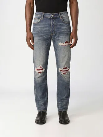 Amiri Jeans slim fit in denim distressed con effetto usurato e design a cinque tasche