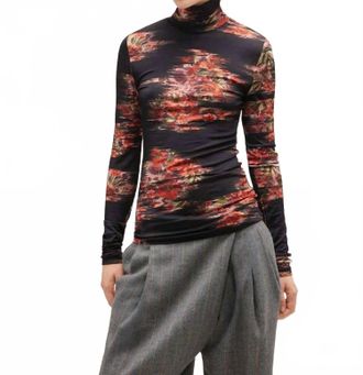 Ganni Printed Shiny Jersey Turtleneck Top In Black