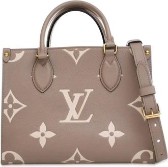 Louis Vuitton Borsa a tracolla OnTheGo PM in pelle Empreinte bicolore con monogramma Giant 2021-2025 - Marrone