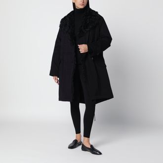 Toteme Parka lungo nero in cotone e shearling