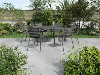 Vente-Unique Sala da pranzo per giardino in metallo - un tavolo rotondo D.130cm e 6 sedie impilabili - Grigio scuro - MIRMANDE di MYLIA