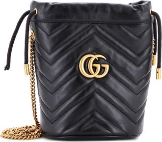 Gucci Borsa a secchiello GG Marmont mini in pelle matelass&eacute; - Nero