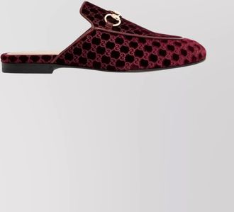 Gucci velvet slippers featuring horsebit detail