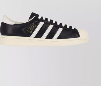 adidas low top rubber sole sneakers