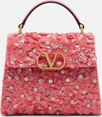 Valentino Garavani Bolso VSling Mini con lentejuelas