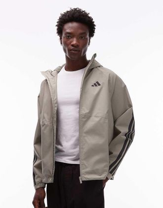 adidas Originals Giacca impermeabile kaki con 3 strisce-Verde
