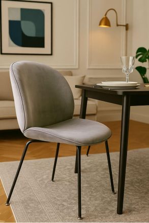 Fusion Living Luxurious Velvet Dining Chair with Black Metal Legs in Light Grey