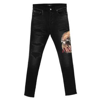 Amiri Ripped Graphic Jeans