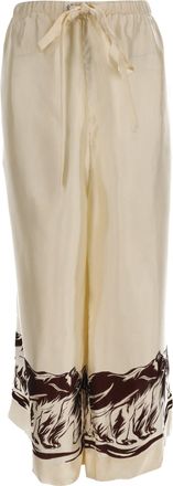 Khaite Phoebe Bear-Print Palazzo Trousers in Beige Silk