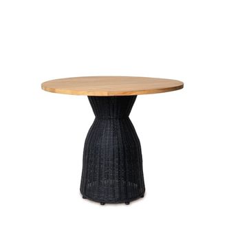 Koketto Home Mesa redonda de rattan en color roble con base en negro