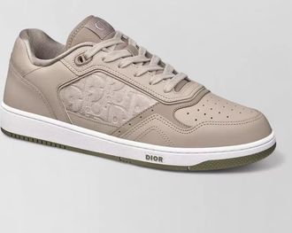 Dior stylish sneakers with perforated toe and rubber sole