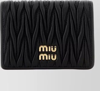 Miu Miu quilted fold-over leather wallet