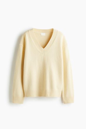 H&M Oversize-Pullover mit V-Ausschnitt - Hellgelb