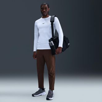 Nike Mens Unlimited Dri-FIT Tapered Leg Versatile Pants in Brown | FB7546-237