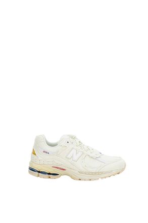 New Balance 2002R Protection Sneakers with Deconstructed Aesthetic