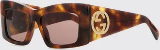 Gucci Occhiali da sole cat-eye in acetato tartarugato con logo GG metallico
