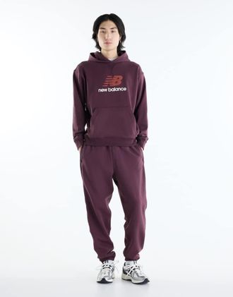 New Balance Athletics jogger in French Terry rosso ciliegia-Marrone