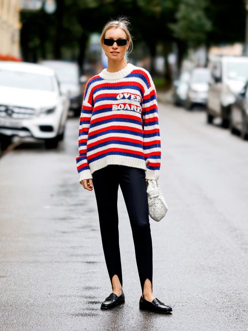 loafers with black pants and striped sweater