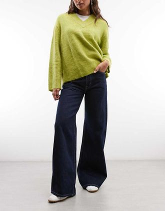 Weekday Paz jeans a gamba larga a vita media, con lavaggio blue rinse