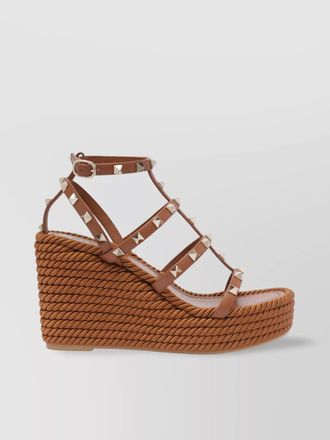 Valentino Garavani sandals with woven wedge heel and studded straps