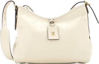 Louis Vuitton CarryAll Monogram Empreinte Giant PM hobo bag - Beige